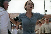 Katniss volunteers